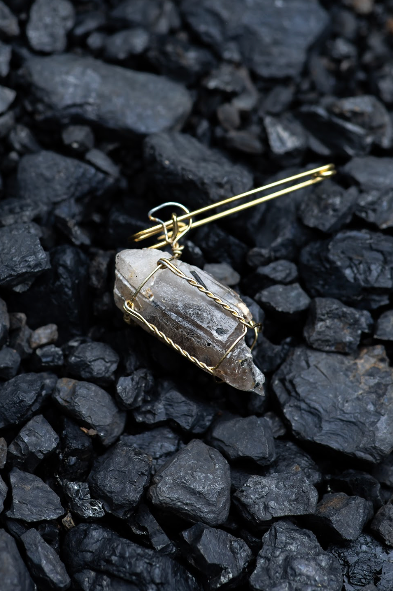 Tourmalinated Quartz in a Cork Cage