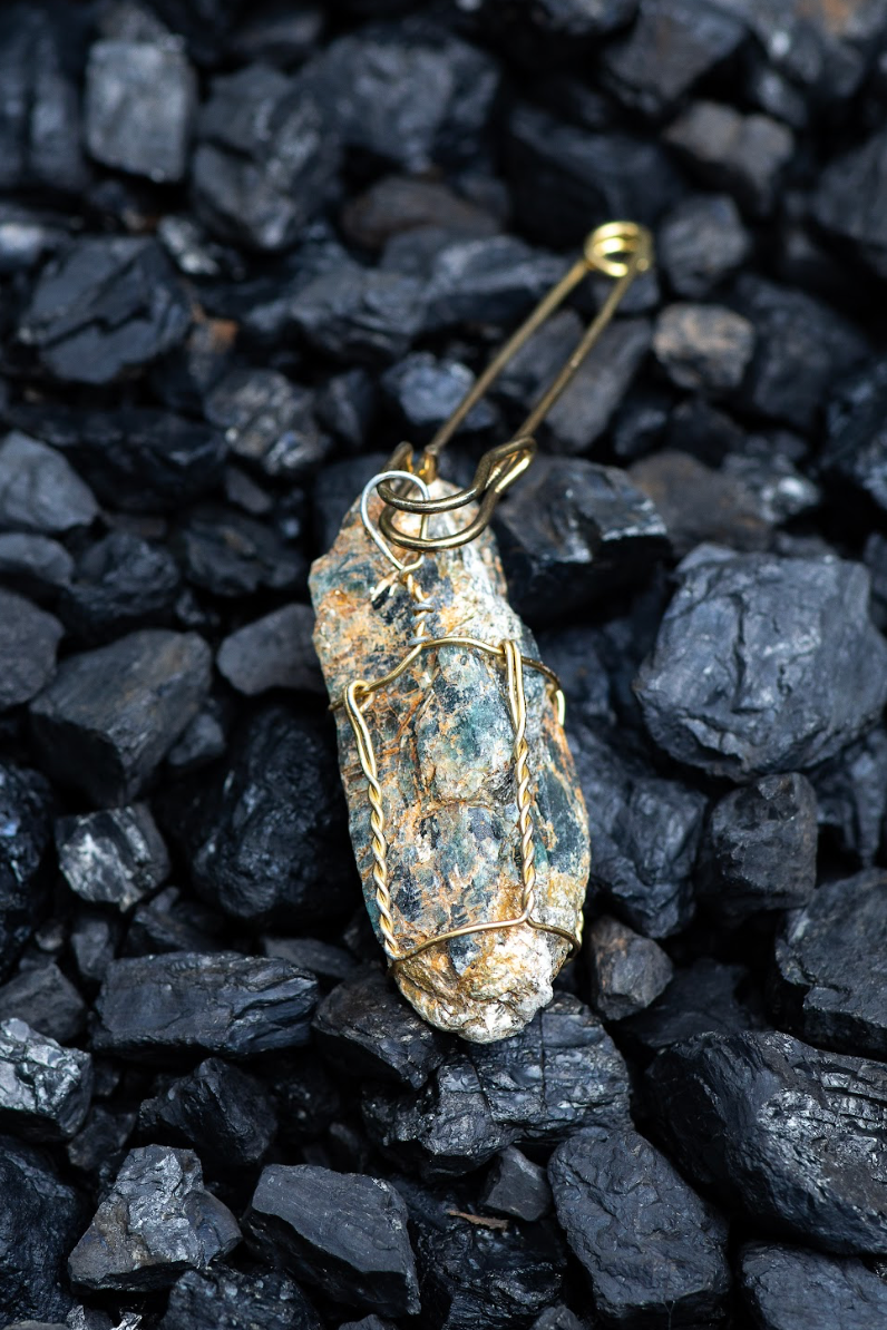 Kyanite Crystal Pendent in a Cork Cage