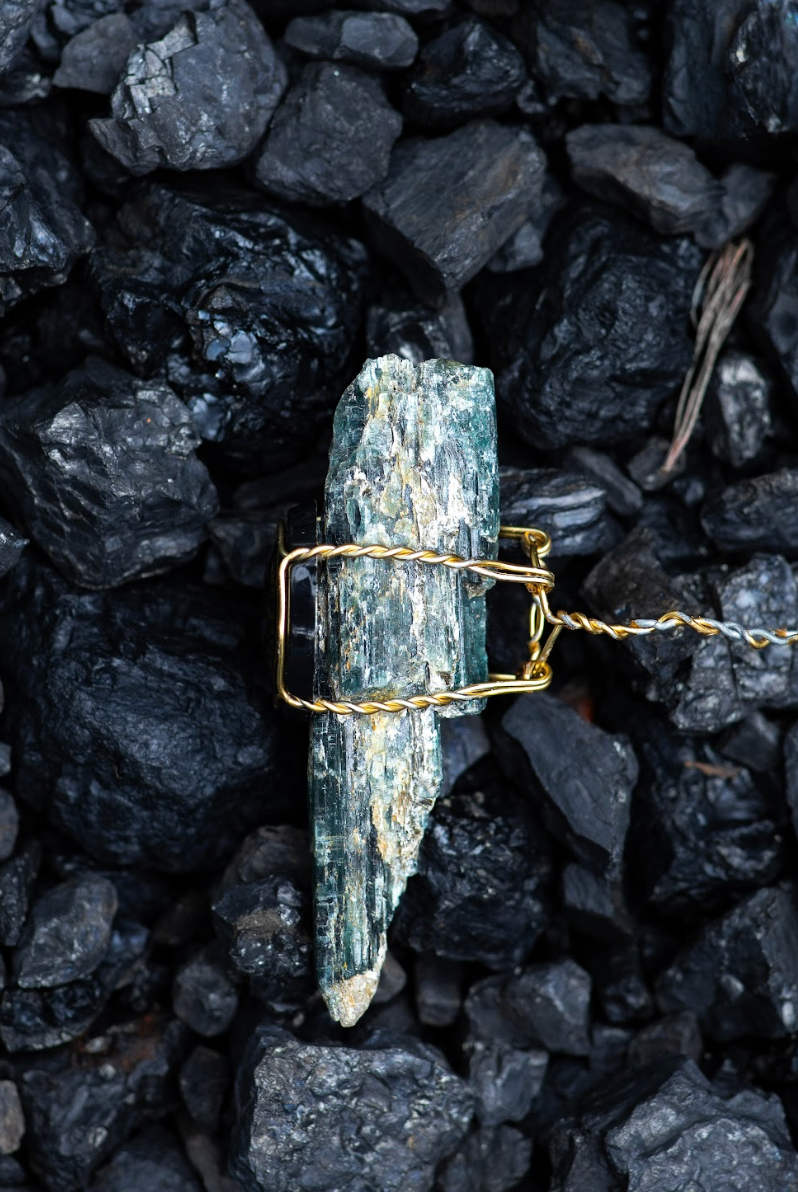 Kyanite Crystal Pendent in a Cork Cage