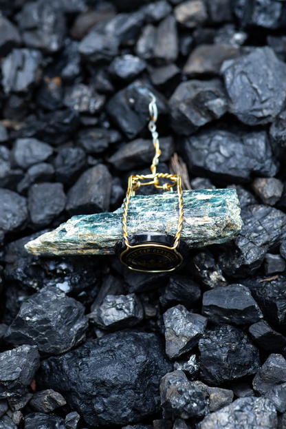 Kyanite Crystal Pendent in a Cork Cage