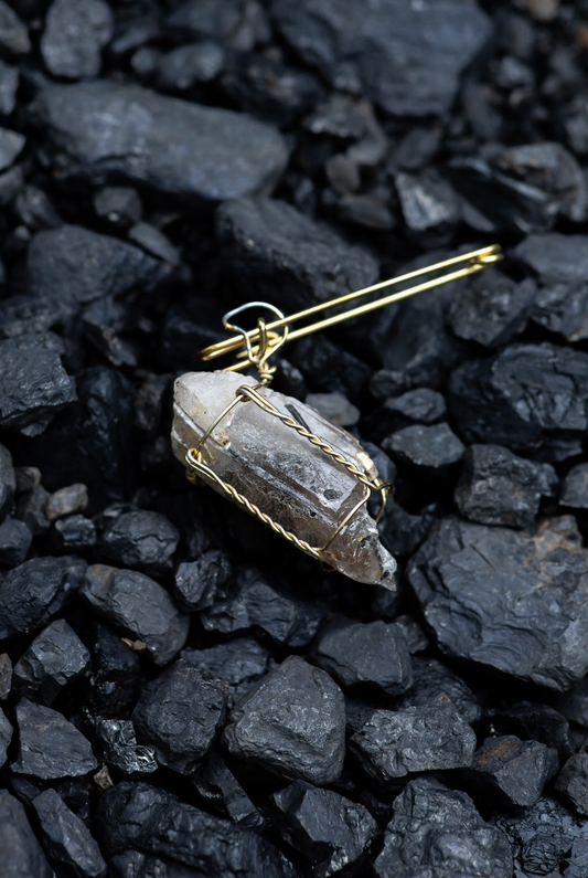 Clear Crystal Quartz in a Cork Cage
